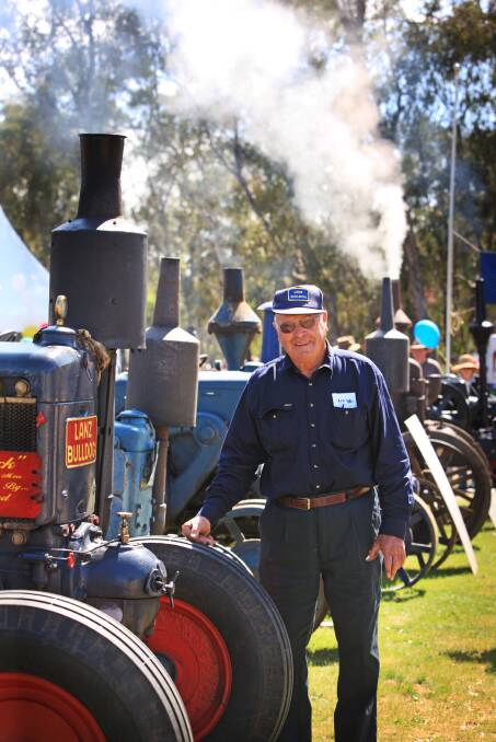 Len Schilg displaying his Lanz Bulldog tractor at the Henty Machinery Field Days