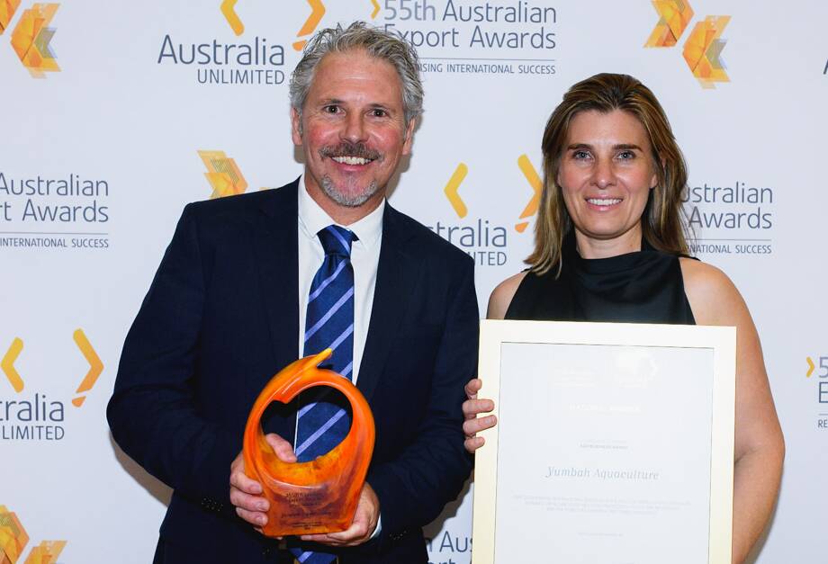 Yumbah Aquaculture general manager, Tim Rudge, collects the Agribusiness Award at the Australian Export Awards in Canberra from Commonwealth Bank of Australia's NSW regional and agribusiness banking general manager, Margot Faraci.