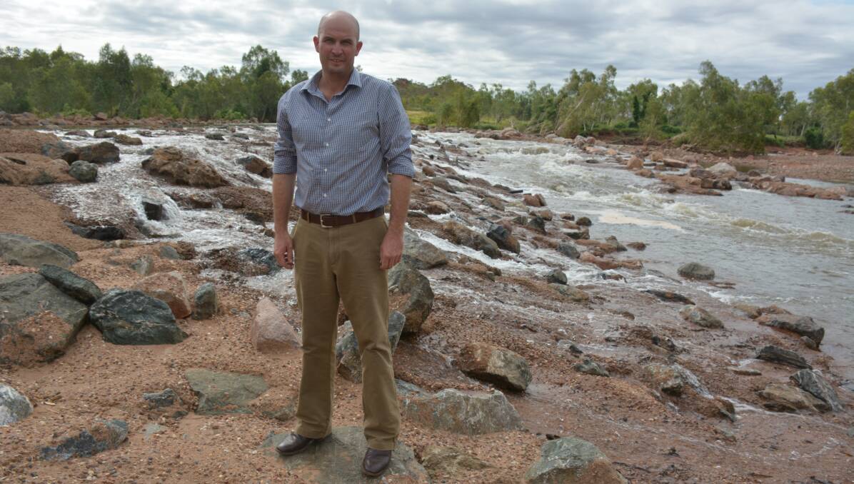 CAN DO: Ergon scheduler and mayoral candidate Greg Campbell standing at the Cloncurry weir. Photo: Chris Burns. 