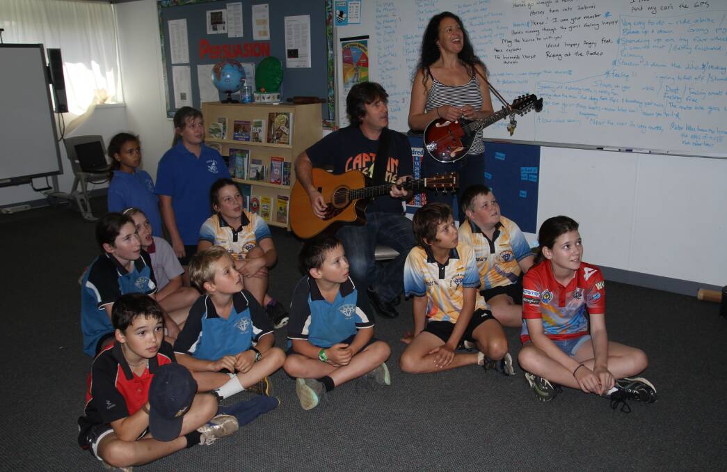 David and Merelyn Carter, Carter and Carter, and students from Mt Surprise and Forsayth State Schools and distance education sing My Motorbike, My Horse and Me.
