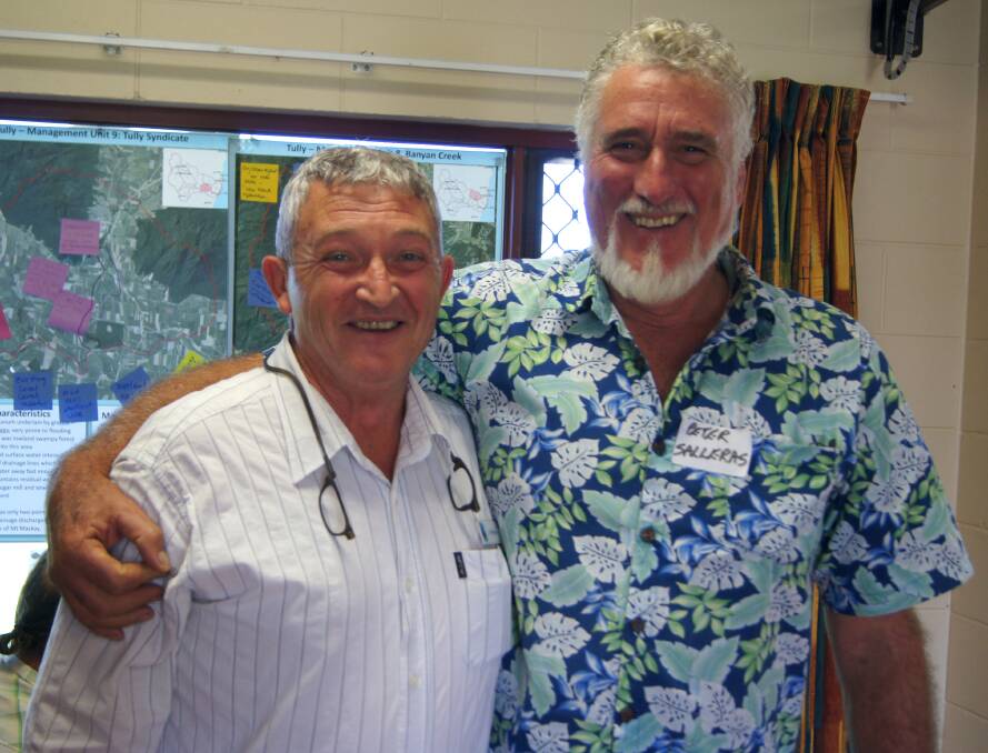 Cassowary Coast Councillor Jeff Baines with tropical fruit grower Peter Salleras at the Tully workshop.
