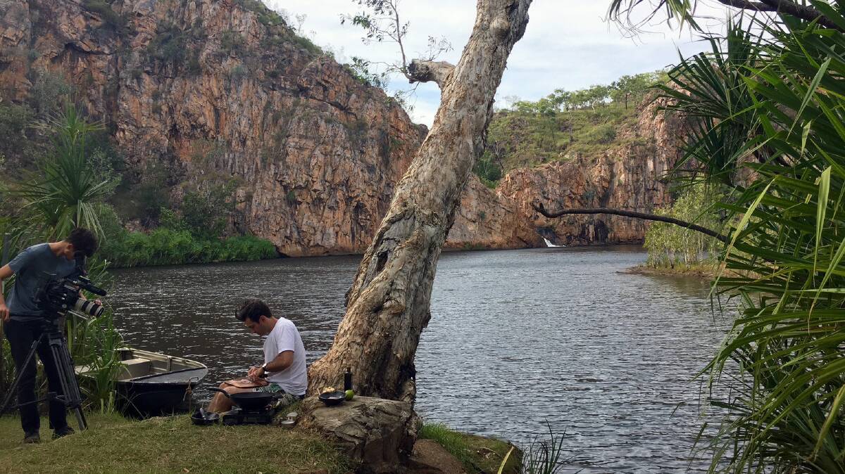 OUTDOOR COOKUP: Lynton’s outdoor cook-out at Edith Falls, Nitmiluk National Park, Katherine. Picture: NT Government.