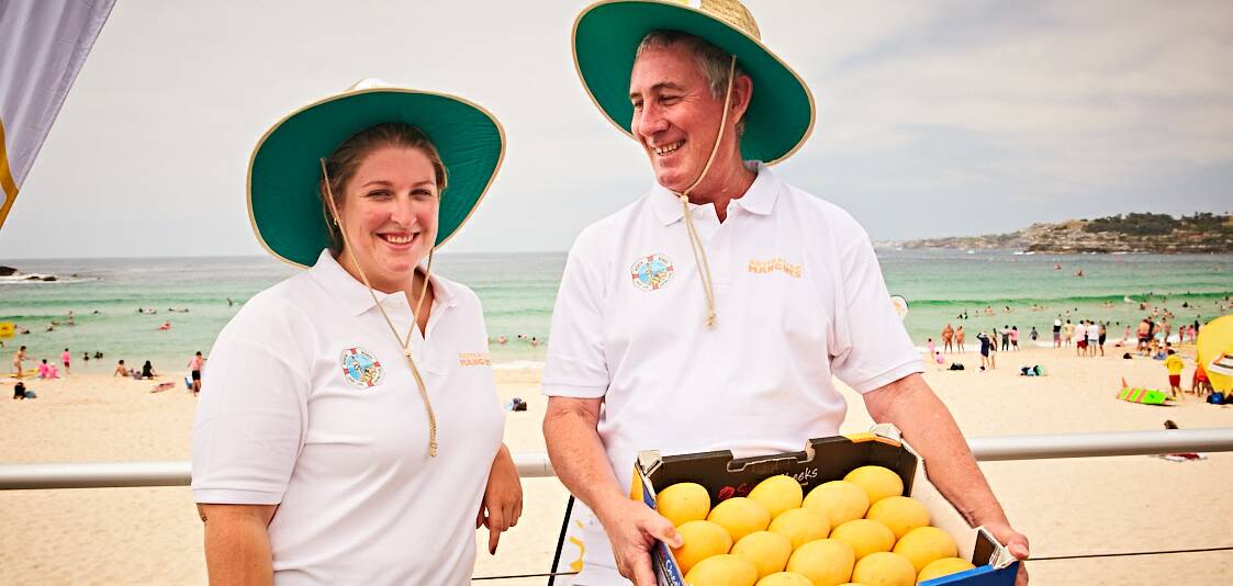 MANGO MADNESS: Katherine mango grower Emma Harrison  and Steve Beaty from Darwin were at the Sydney promotion. Picture: supplied.