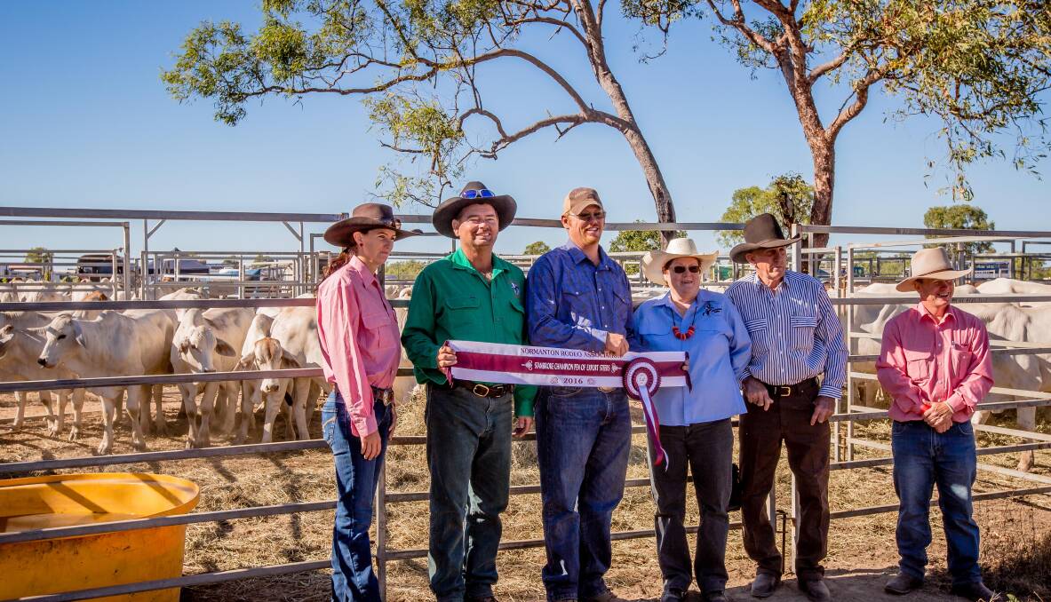 Kate Knowles, Elders Mareeba with competition winners the Gallagher family, Kelwood, Laurie Blacklock, Haddington Station, Julia Creek and Tom Kennedy, Elders Townsville.