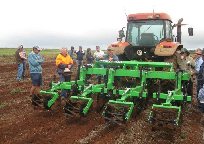 Innovative farmer Ben Poggioli demonstrating strip-tillage equipment during a field day held at Kairi recently. Strip-tillage will be one of the topics covered during the three shed meetings in October.