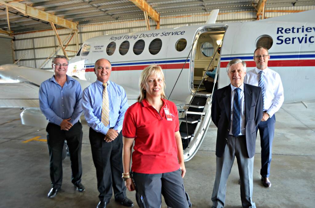 Deputy mayor of Townsville Les Walker with RFDS Qld Section CEO Nino Di Marco, Townsville Base nurse Debbie Schmidt, RFDS Qld Section chairman Mark Gray and Energy Queensland CEO David Smales.
