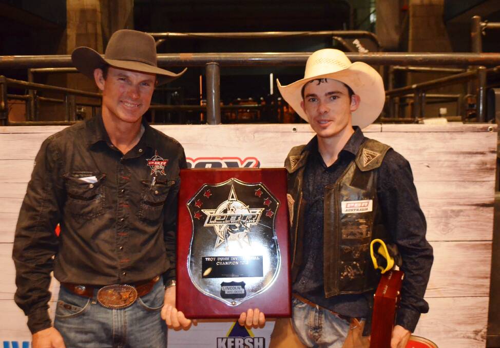 Troy Dunn congratulates 2015 PBR Troy Dunn Invitational winner Cody Heffernan,Singleton, NSW. Heffernan was the only rider to stay on his bull for all three rounds during the event held in Townsville last night.