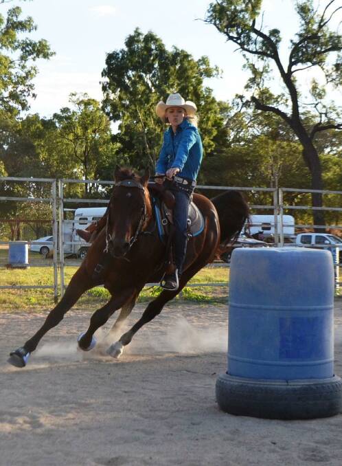 Ready to ride: Carly Ormonde practicing at the Rupertswood & District Horse Club in preparation for the Barrel Race Spectacular taking place on August 6 in support of The Motor Neurone Disease Research Institute of Australia.