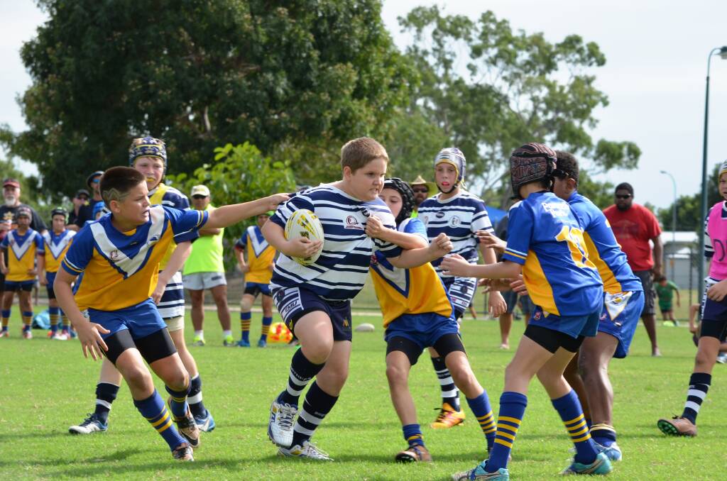 Top flight league action: A great match ensued between Townsville Brothers Blue and the Innisfail Cowboys during the Laurie Spina Shield Under-11s rugby league carnival held in Townsville on June 26-27.