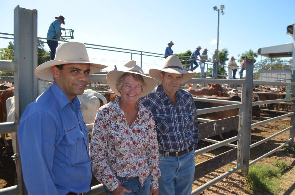 QLD Rural director/manager Troy Trevor, talking shop with Brian and Lorraine Corbett, Hyde Park, Belyando, who were impressed with the conditioning of the cattle yarded at the Charters Towers store and prime sale held on May 25.