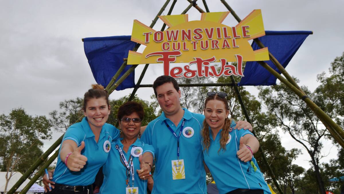 A resounding thumbs up: Townsville Intercultural Centre volunteers Alex Mullany, Thez Hamilton, Ken Pedler and Monika Webb having a blast at the 2016 Townsville Cultural Festival being held at James Cook University.