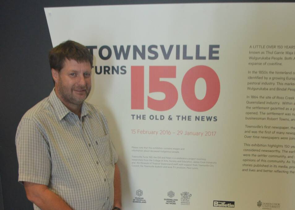 History lesson: MTQ director Peter McLeod at the entrance to the 'Townsville turns 150 the old & the news' exhibit which will be on display until Sunday, January 29, 2017.