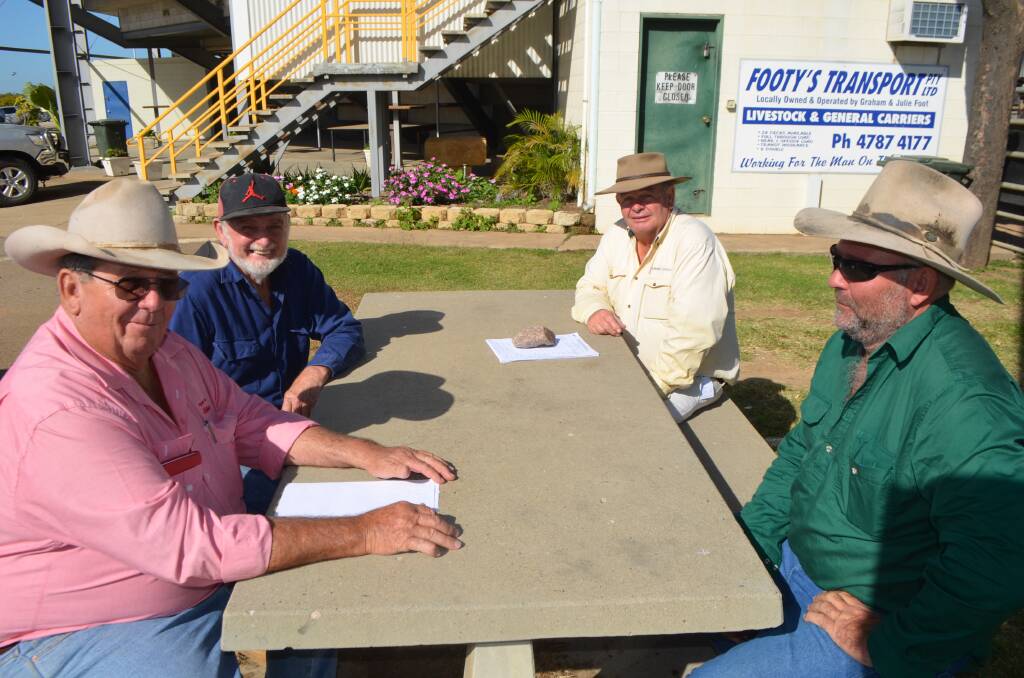 Group meeting: (clockwise from left) Malcolm Smith, Elders Charters Towers, with Roy MacDonald, Rosevale, Woodstock, Kevin Currie, Ray White Townsville and Mark Schmid from Oak Valley.