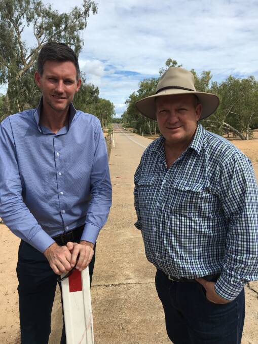 Minister for Main Roads, Road Safety, and Ports Mark Bailey with Member for Dalrymple Shane Knuth at Cape River Bridge earlier this year.