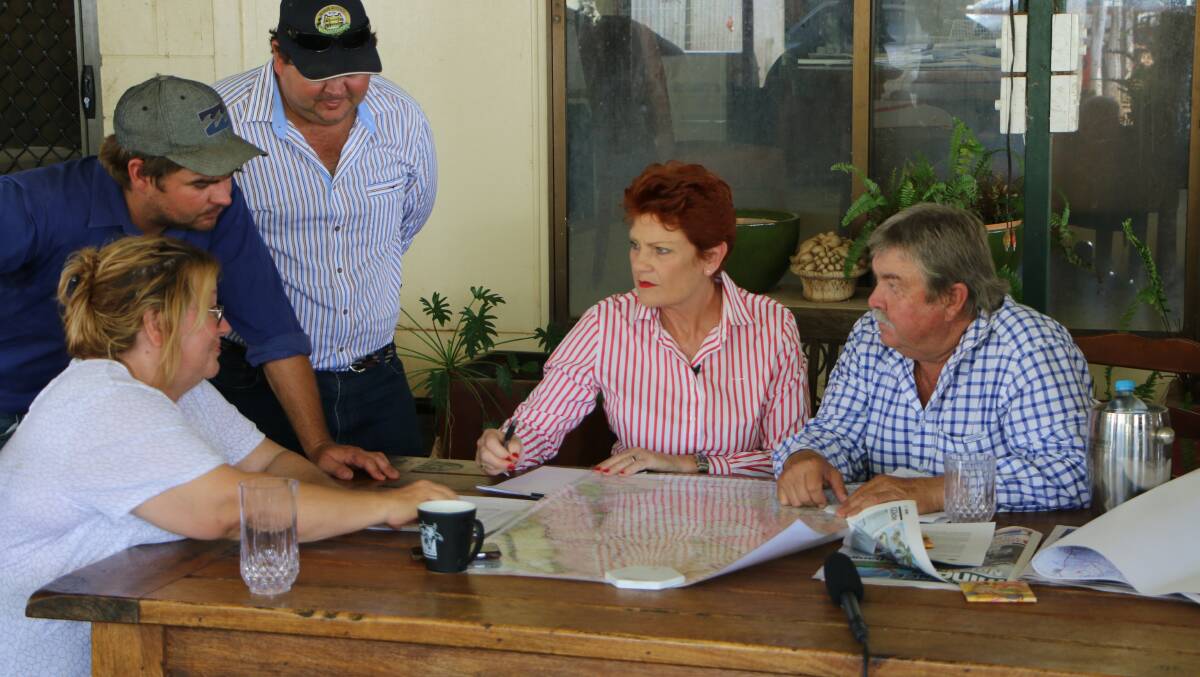 Pauline Hanson has been devoting a considerable amount of time on Queensland issues, including with Charters Towers graziers (seen here) concerned about the possible compulsory acquisition of their land by the defence department.