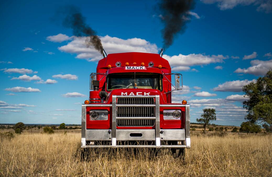 Blowing smoke, this is one of the stunning images found in the book that documents the life of a truckie.