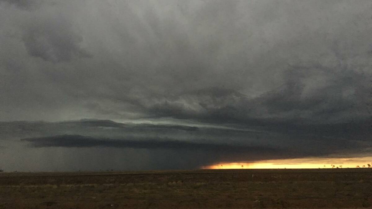 Here comes the rain: A storm dumped a delicious 90mm of rain for the Walker family at Camden Park, 10km east of Longreach yesterday. Photo: James Walker.