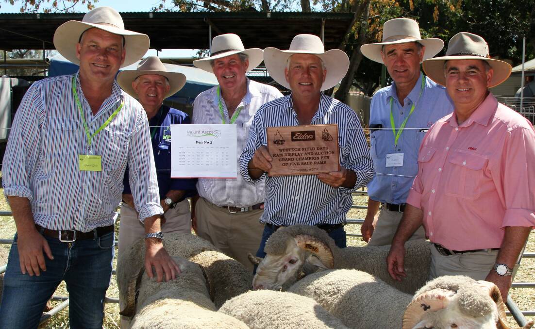 There were plenty of people on hand to congratulate Nigel Brumpton, third right, on his champion pen, including the Member for Gregory, Lachlan Millar, Westech president, Andrew Cowper, QMSSA president, Max Wilson, judge, Cam Munro, and Elders wool representative, Bruce McLeish.