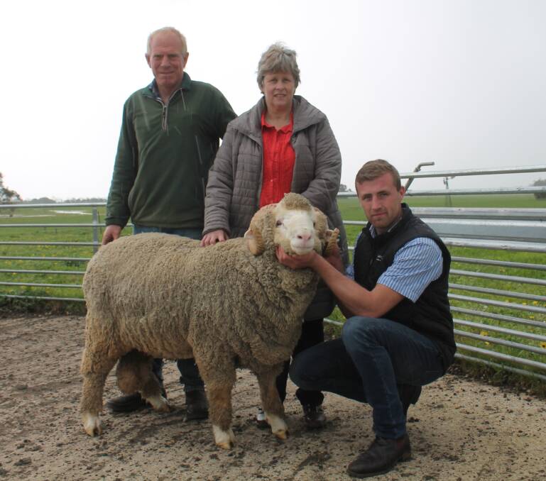 Ian and Fiona Zippel, Naracoorte, SA, pictured with Rock-Bank's Sam Crawford, purchased seven rams for an av $1250.