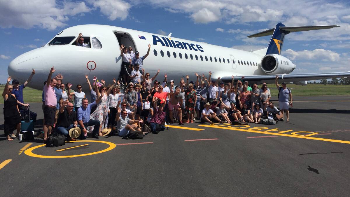 A chartered flight to the 2016 Roma Picnics helped raise money for Youngcare.