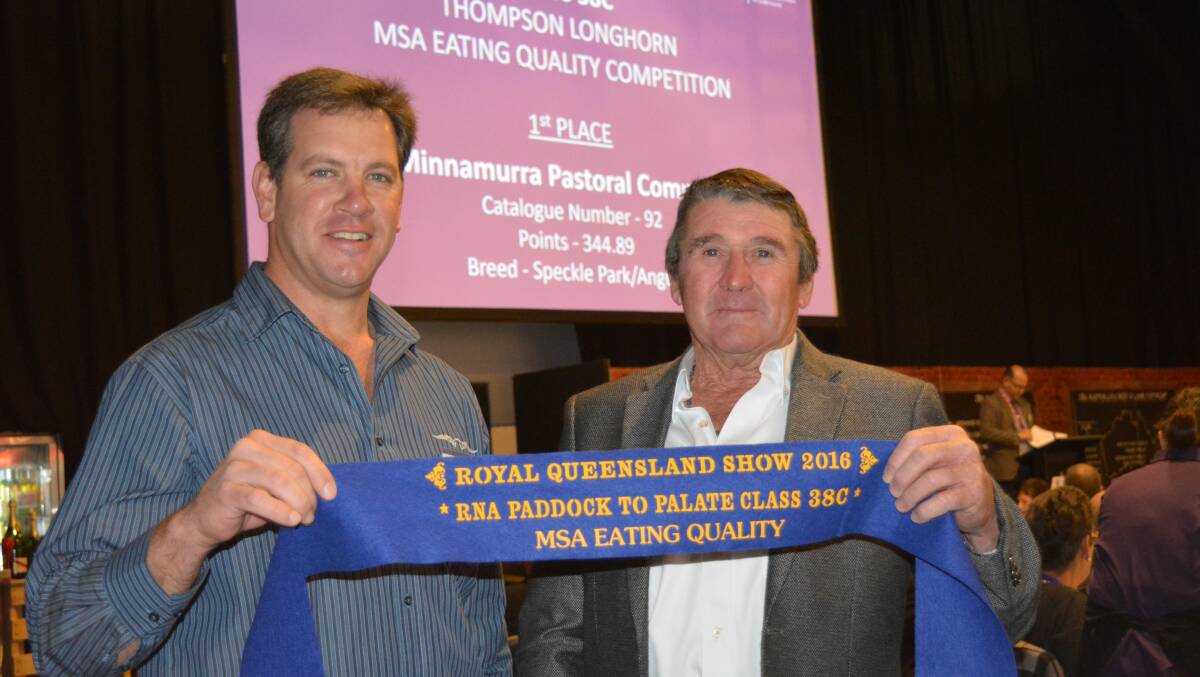 Byron Wolff, Thompson Longhorn, presenting first place in the trade MSA eating class to Dennis Power, Minnamurra Pastoral Company at Willala in August. 