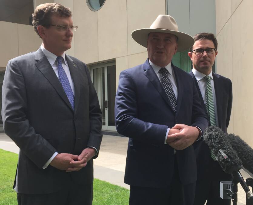 NSW Nationals MP Andrew Gee (left), party leader and Infrastructure and Transport Minister Barnaby Joyce and Agriculture Minister David Littleproud (right) speaking to media in Canberra this week after securing the 'Barnaby Bank'.