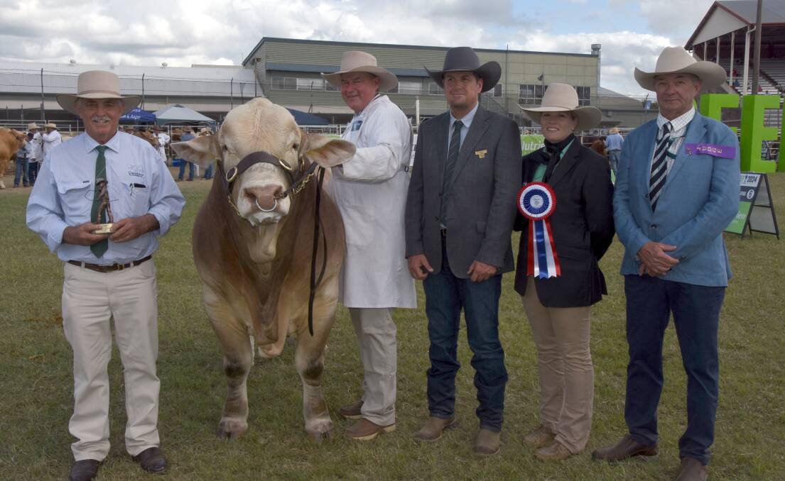 Owner Les Marshall, Greenfields Charbrays, Jambin with his grand champion Charbray bull, Greenfields Smithy, held by Terry Connor, Timbrel, alongside Glen Zeimer, president, Charbray Society of Australia, Mt Larcom, Bronte Austin, Nutrien Ag Solutions, Rockhampton and judge David Bondfield, Dalveen. Picture by Ashley Walmsley