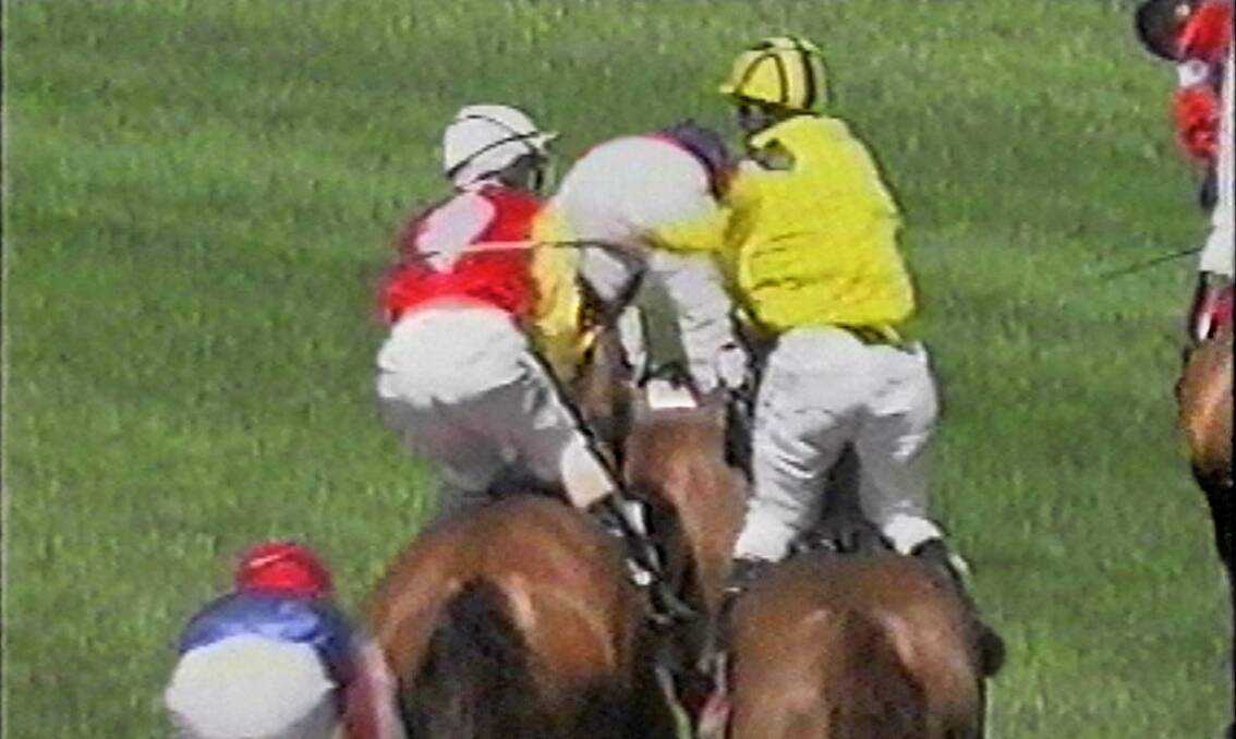 EXPLOSIVE: Jockey Danny Adam, right, whips fellow jockey Michael Guthrie after the Bairnsdale Cup in January 2006.