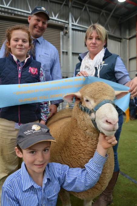 The Scott family of Valley Vista stud, Coolac, have taken out the supreme Poll Dorset exhibit at the Australian Sheep and Wool Show, Bedigo. Pictured from right, Zac, Sally, Andrew and Donna Scott. 