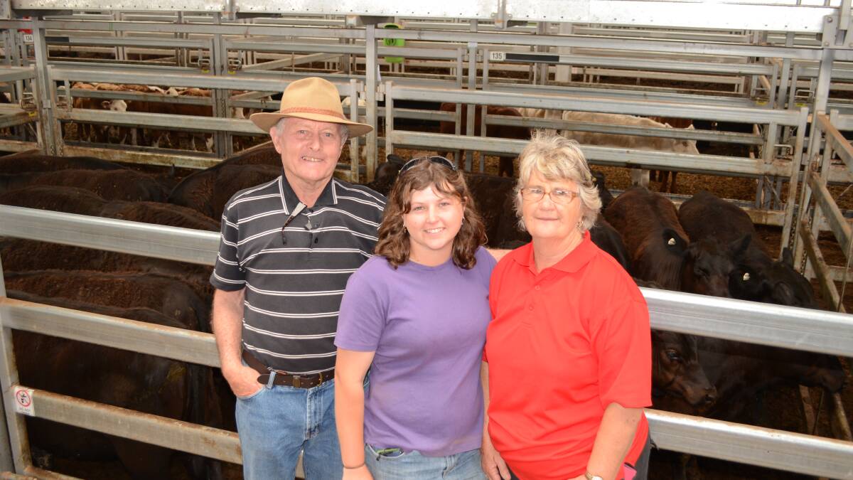 Graeme and Dawn McCauley, "Tiviot Vale", Huon with their granddaughter Jessica Ward, selling Angus weaner steers for $1200. 