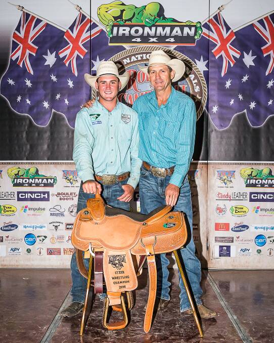 PRIZE: Ryley is pictured with his father, Mark, the last Queenslander to win the title back in 1989. Photo: Stephen Mowbray Photography.