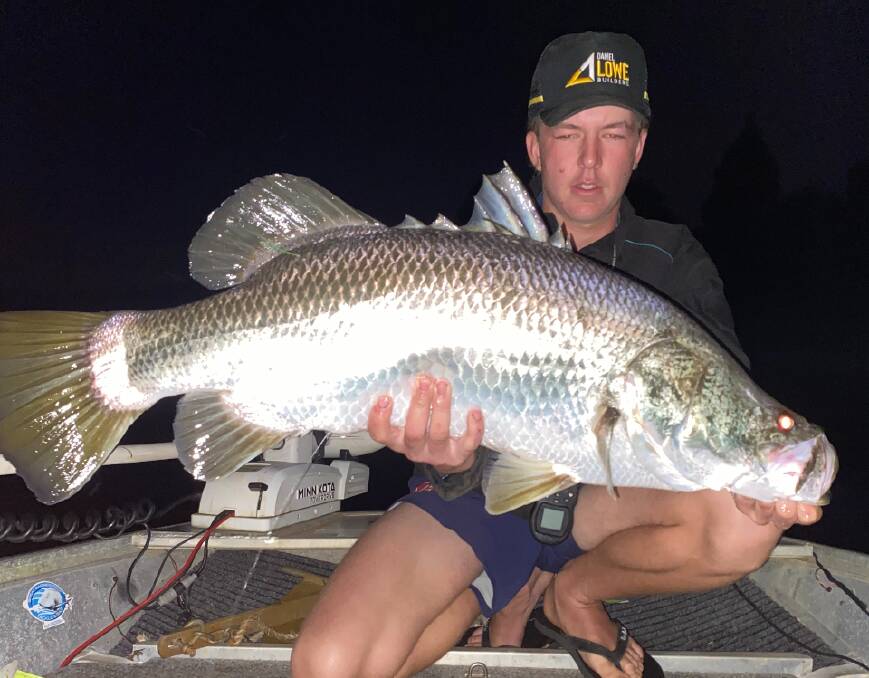 Tate Gowan claims $20,000 prize money reeling in a tagged barra at Lake Tinaroo. Picture supplied.