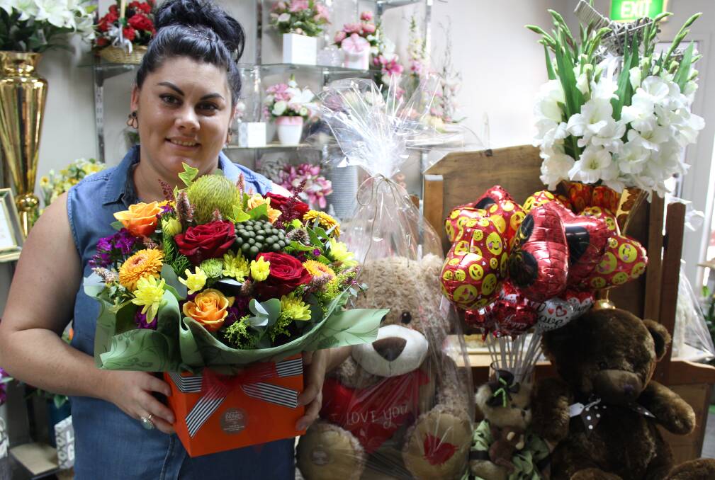 LOVE IS IN THE AIR: Owner of Charters Towers Blossom Shoppe, Gayette Burt, stacks her shelves with goodies for Valentines Day. Photo: Samantha Walton.