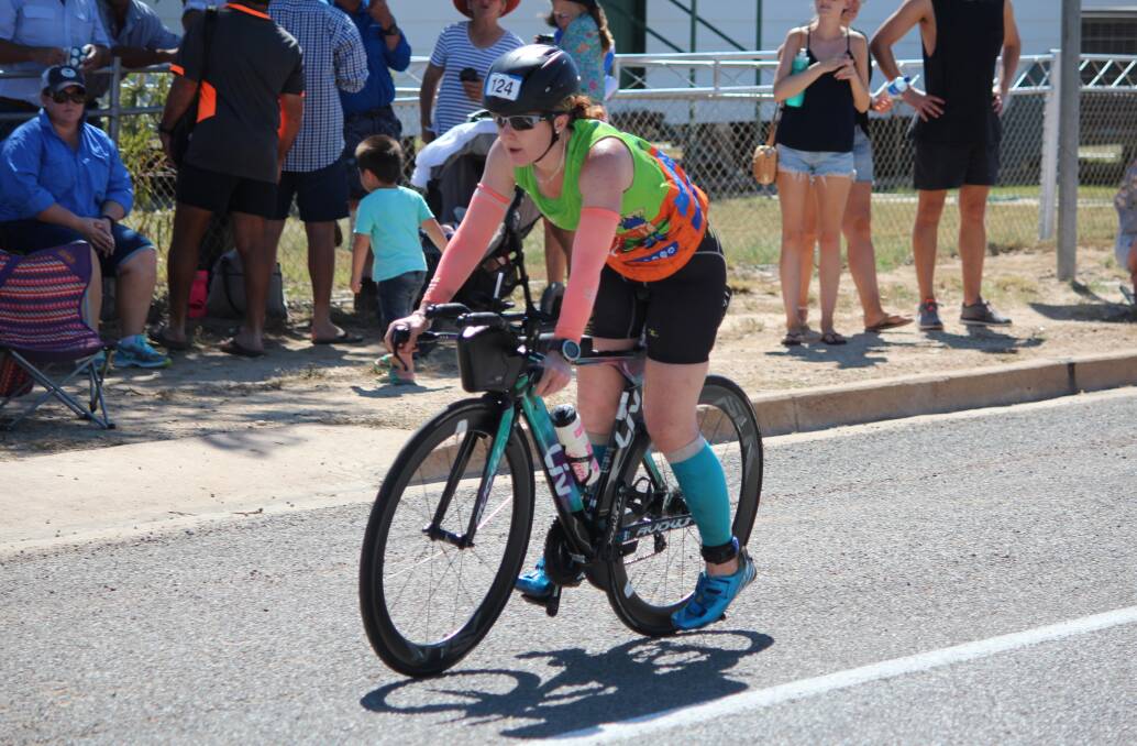 Fiona Lenz completes her cycle and heads into transition.