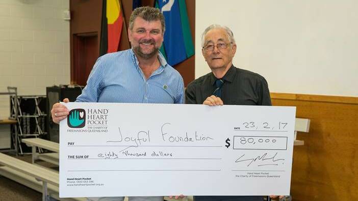 Hand Heart Pocket the Charity of Freemasons Queensland, Chief Executive Officer, Gary Mark with Joyful Foundation Founder, Ron Donnellan. Photo supplied.