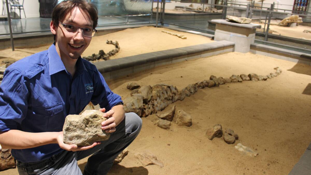 FIND: Dr Patrick Smith shows a fossil of stomach content of an Elasmosaurus at Richmond's Kronosaurus Korner. Photo: Samantha Walton.