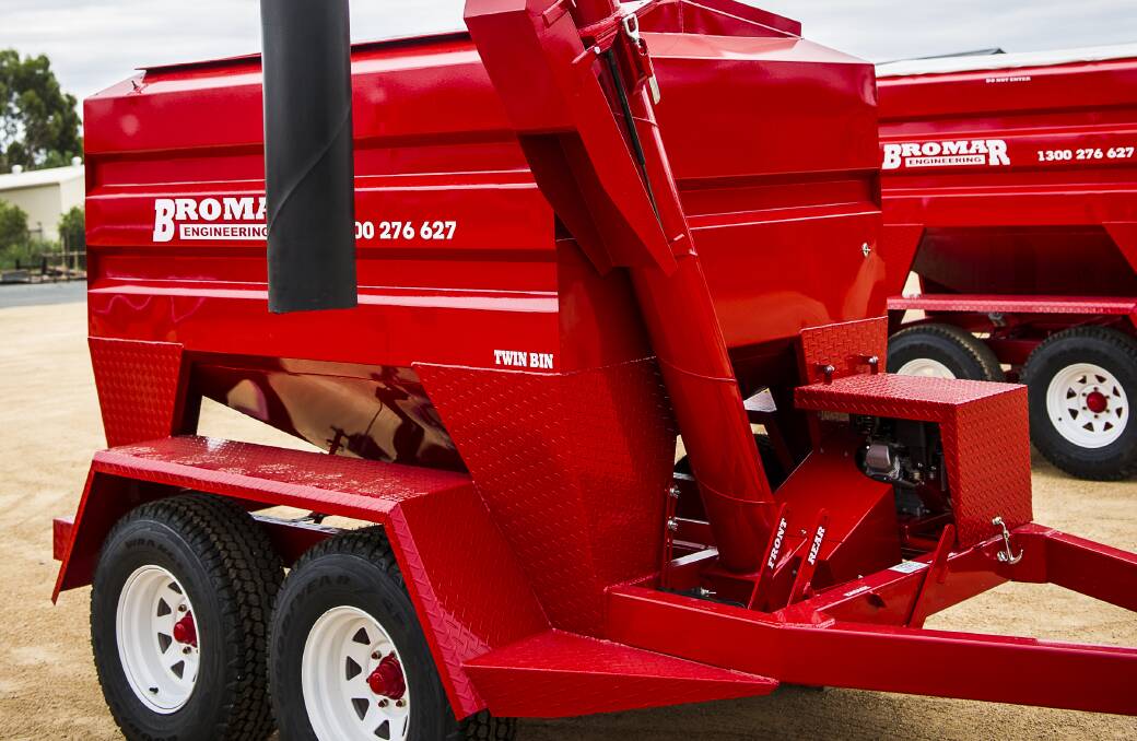 VERSATILE: Bromar 36 bag multifeeder with tall auger and telescopic combine tube.
