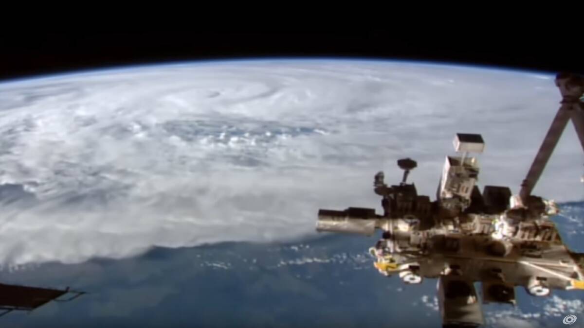 The International Space Station orbiting near Cyclone Debbie. Photo: Force Thirteen, Youtube