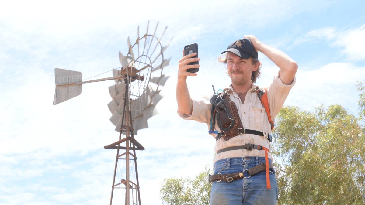 Wayde Girdler on his parent's "Westward Downs" property, west of Packsaddle. The Girdlers suffer with poor mobile coverage, but are holding off making the switch to the NBN due to the slew of bad reports from neighbours who have signed up.