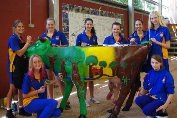 Malanda State High School students working on their entry for this year's 2014 Archibull Prize.  Located behind them is a board which has ideas contributed by Beef producers about sustainability in the Beef industry. 