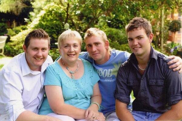 Wendy Sweeney with her three sons, photo taken a few months before Mitchell's death.