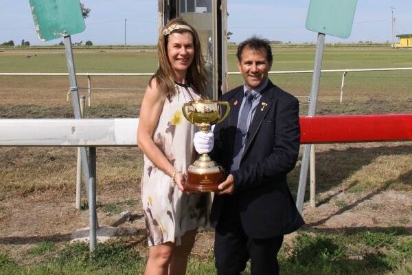 Jo Hutson, VRC Tour Ambassador, and 1999 Melbourne Cup winning jockey John Marshall with the iconic Melbourne at Home Hill Saturday.