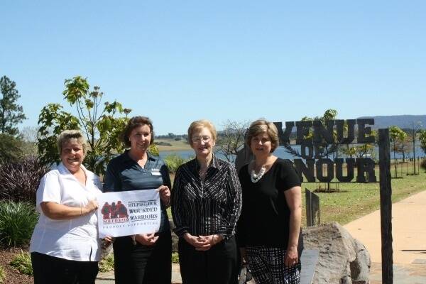 Australia Defence Credit Union (ACDU) representatives Sharon Witte and Michelle Bartholomew, Tablelands Regional Council Mayor Rosa Lee Long and Yungaburra Triathlon  event manager Janet Greenwood at the Afghanistan Avenue of Honour.