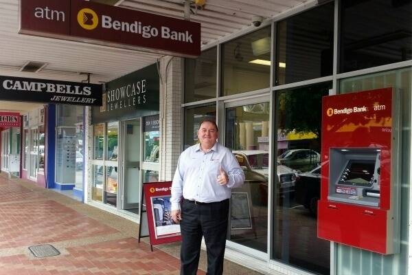 SBCFS Ltd Board Chairman Darren West outside the potential site of the second Burdekin Community Bank which is currently occupied by Bendigo Bank.