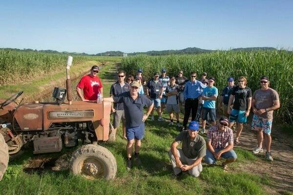 Delegates tour Robert Quirk’s cane farm at the end of the 2013 conference.