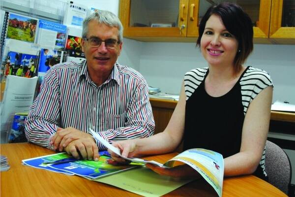 Burdekin Shire Council Economic Development Manager Adrian Scott and Support Officer Eliza Lovell put the final touches to the program for the Rabobank Burdekin Value-adding Seminar.