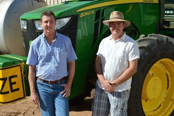 Primary Industry and Fisheries Minister Willem Westra van Holthe outlines the government’s assistance plan for watermelon producers impacted by CGMMV with Katherine grower Mitchell Curtis last month.
