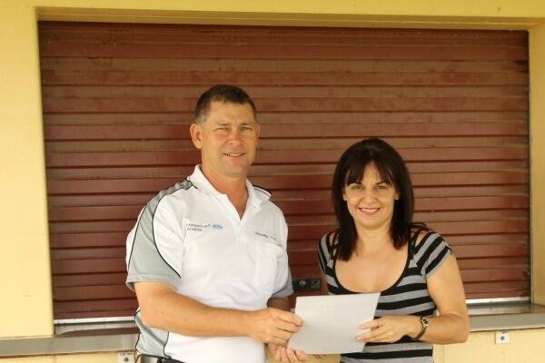 Rotary FNQ Field Days Food sub-committee representative Sherri Soncin and Andrew Ford, Mareeba Cricket Club, discuss arrangements for food vendors at the 2015 event.