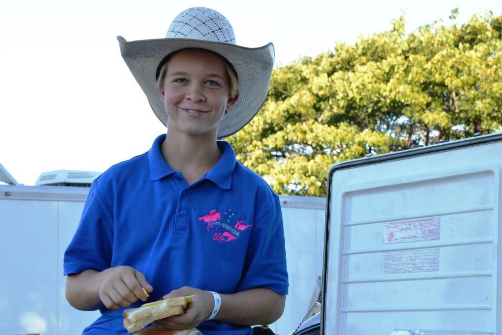Eli Bee claimed an easy victory at the Katherine Rodeo in the junior steer ride with a score of 63 which was 10 points ahead of second place. He is pictured with his prized ham sandwich. 