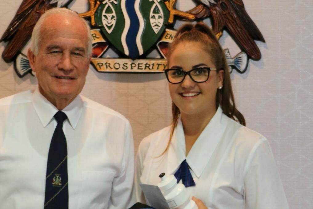 Burdekin Mayor Bill Lowis with 2015 Wingate Properties North Queensland Sport Encouragement Bursary recipient Danae Olsen.